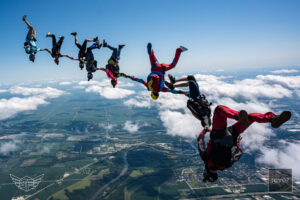 You can learn to freefly after earning a skydiving license. These skydivers are vertical skydiving over Skydive Chicago.