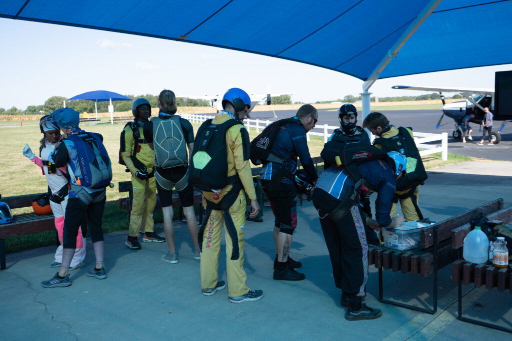 Several solo skydiving students at the boarding area at Skydive Chicago
