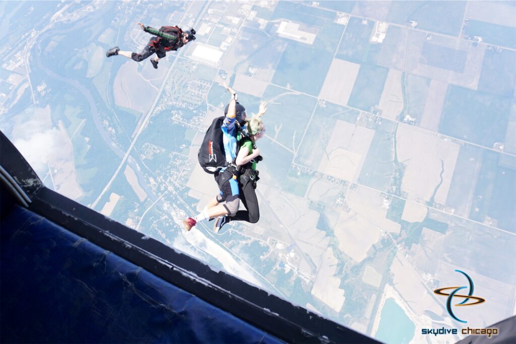 First jump tandem skydiving student jumps to overcome their fear of heights