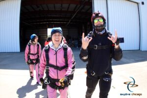 Walking out to the plane for a winter tandem skydive at Skydive Chicago