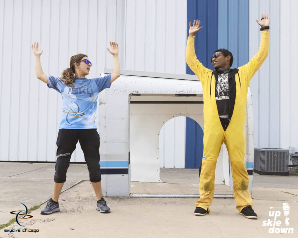 Nicole teaching empathy with a solo skydiving student in the AFP program at Skydive Chicago