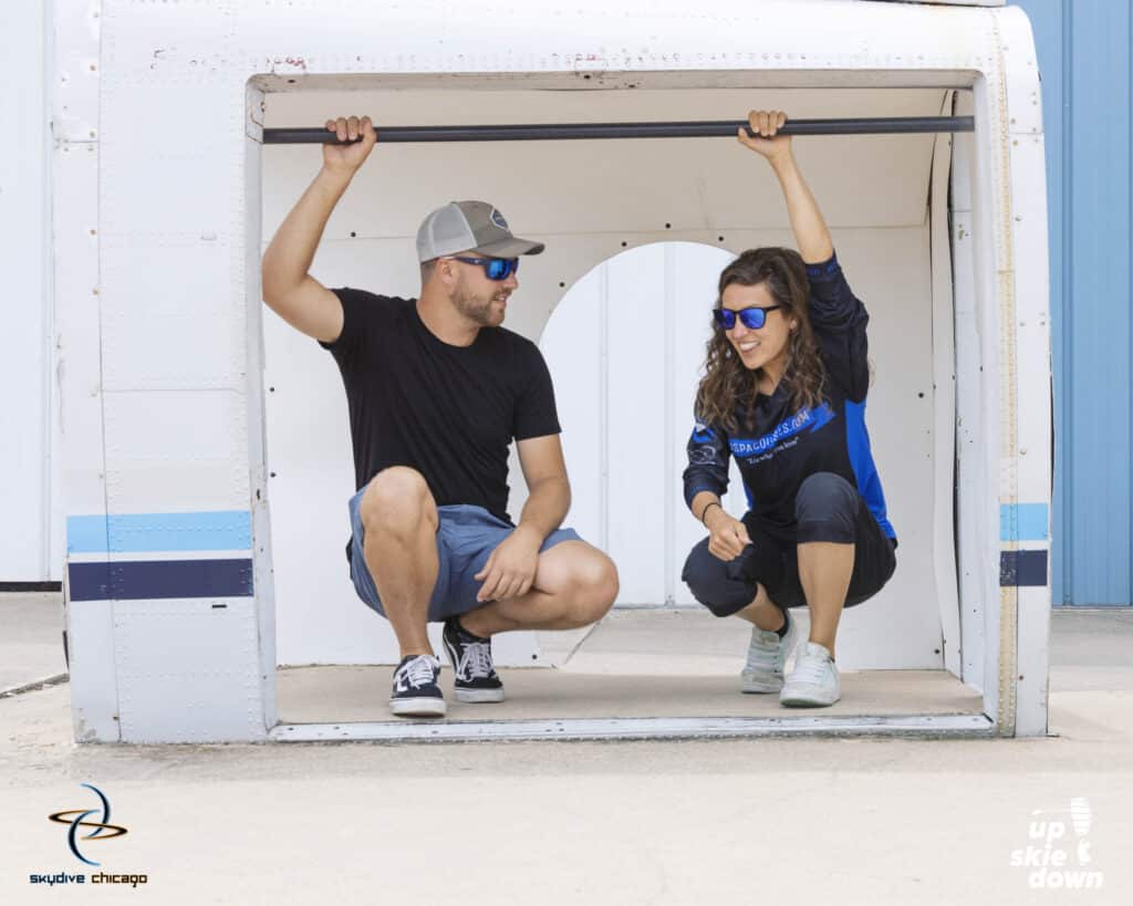 AFP Instructor, Nicole Richards works with a solo skydiving student who is now a licensed skydiver