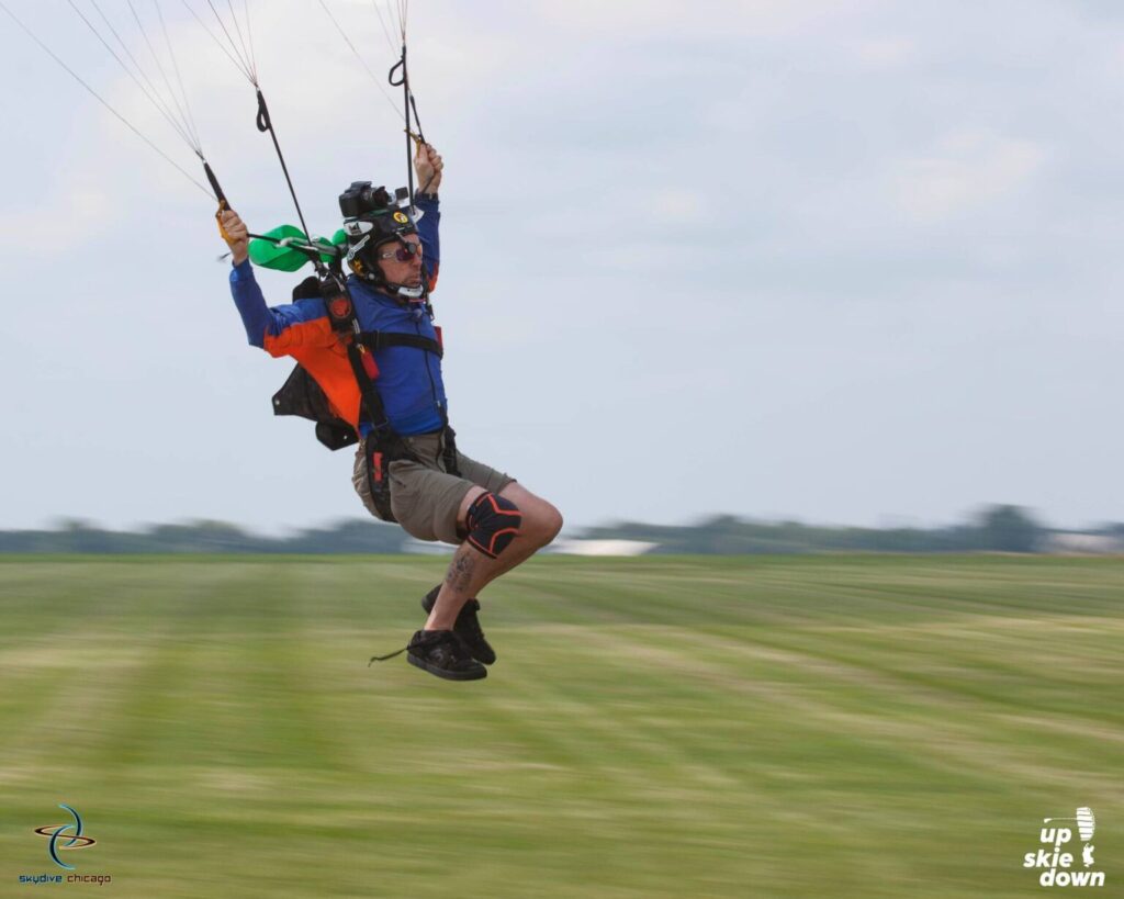 Videographer Charles Lane swoops his parachute at Skydive Chicago