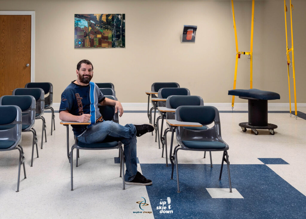 Skydiving instructor Derek Baxter in the classroom