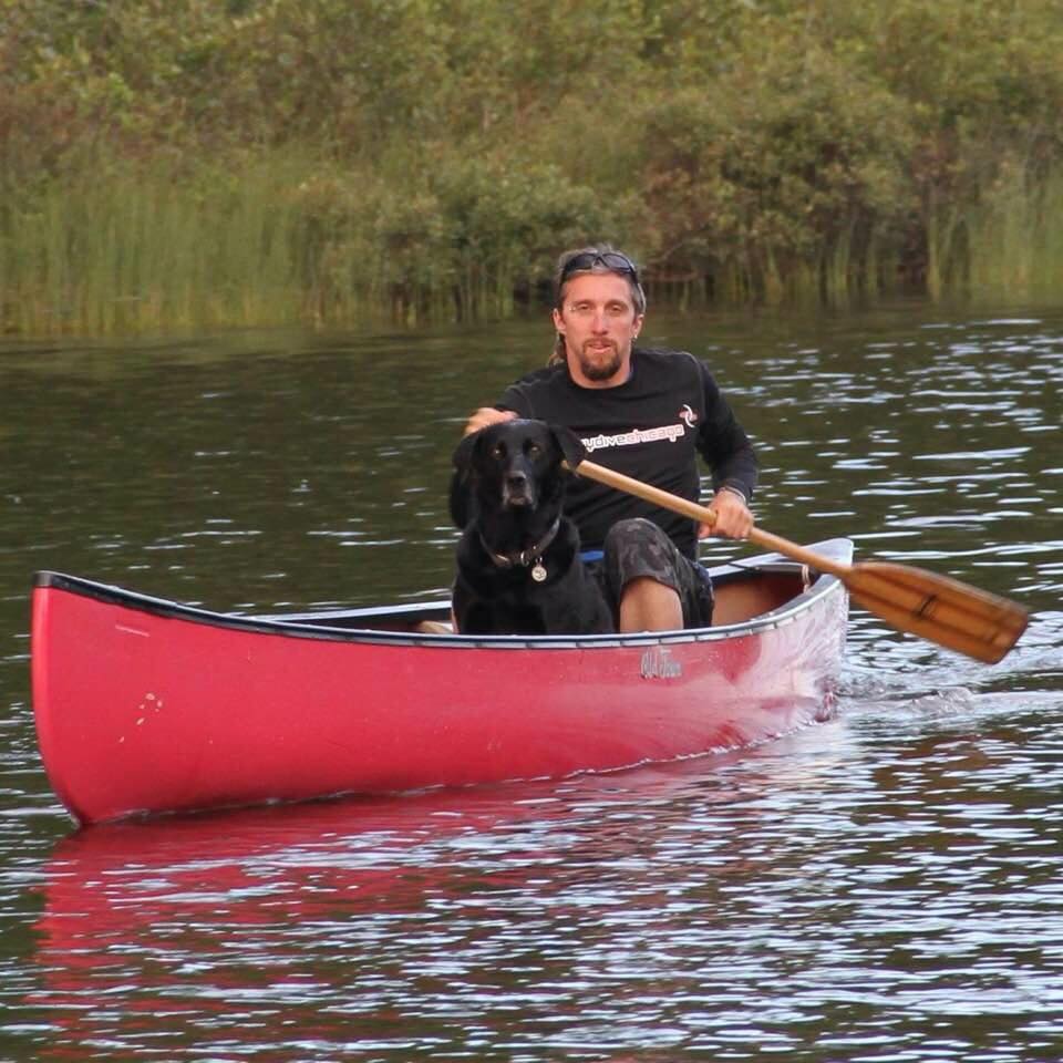 Chad Staerkel canoeing down the Fox River near Skydive Chicago