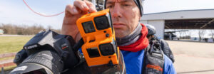 Charles Lane turns on his cameras before a skydive