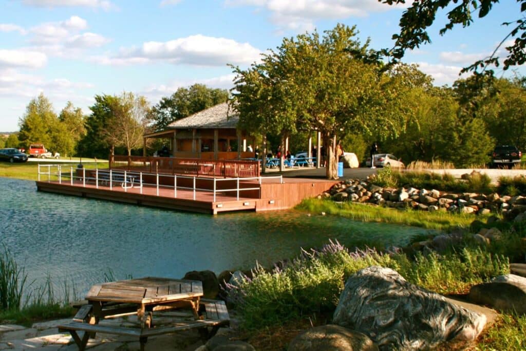 Skydive Chicago's onsite tiki hut by the pond