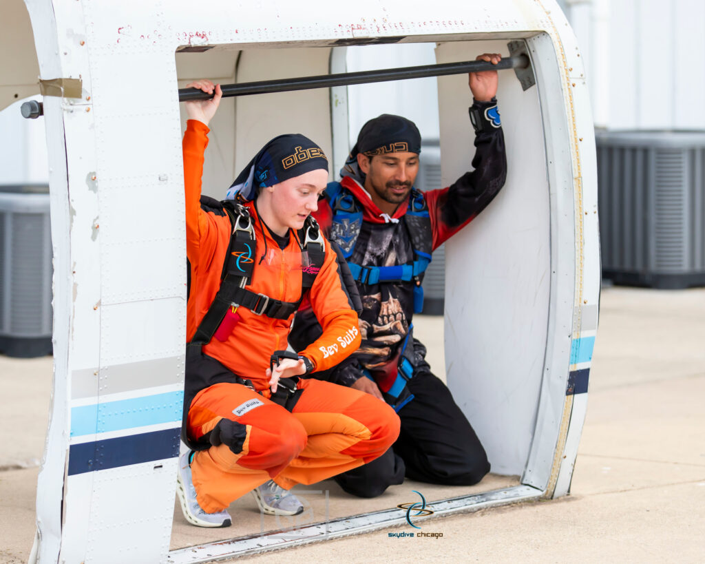 a skydiving student learning how to solo skydive preparing at the mockup